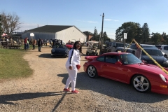 SEM Community Chair Chrissy greeting the incoming cars