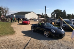 SEM Community Chair Chrissy greeting the incoming cars