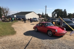 SEM Community Chair Chrissy greeting the incoming cars