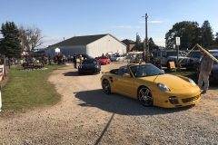 SEM Community Chair Chrissy greeting the incoming cars
