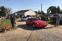 SEM Community Chair Chrissy greeting the incoming cars