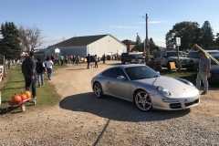 SEM Community Chair Chrissy greeting the incoming cars