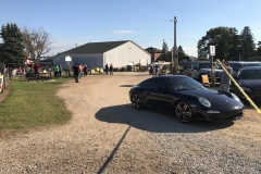 SEM Community Chair Chrissy greeting the incoming cars