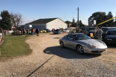 SEM Community Chair Chrissy greeting the incoming cars