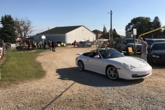 SEM Community Chair Chrissy greeting the incoming cars