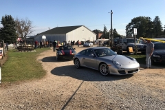SEM Community Chair Chrissy greeting the incoming cars
