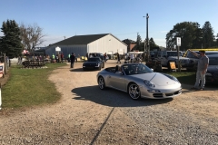 SEM Community Chair Chrissy greeting the incoming cars