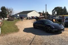 SEM Community Chair Chrissy greeting the incoming cars