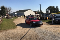 SEM Community Chair Chrissy greeting the incoming cars