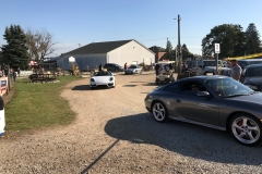 SEM Community Chair Chrissy greeting the incoming cars