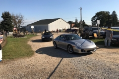 SEM Community Chair Chrissy greeting the incoming cars