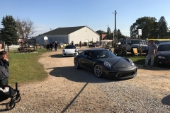 SEM Community Chair Chrissy greeting the incoming cars