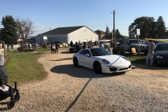 SEM Community Chair Chrissy greeting the incoming cars