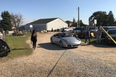 SEM Community Chair Chrissy greeting the incoming cars