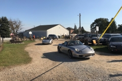 SEM Community Chair Chrissy greeting the incoming cars