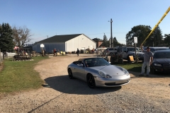 SEM Community Chair Chrissy greeting the incoming cars